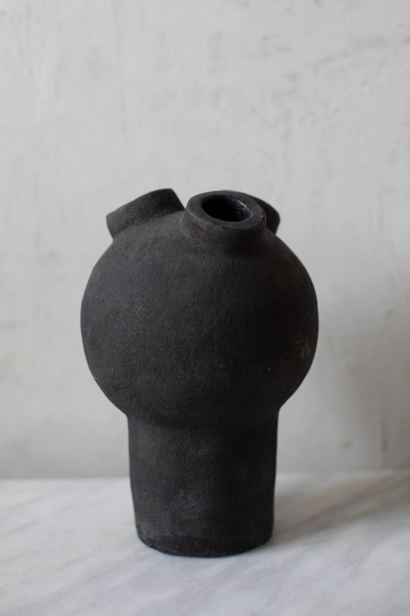 black ceramic vase